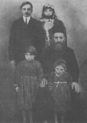 An Armenian priest and his family
